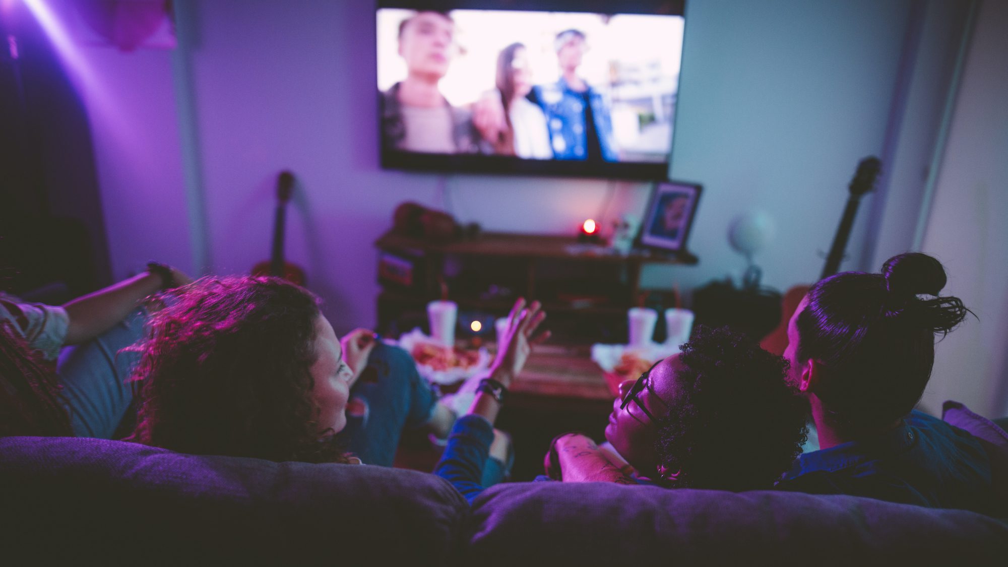 Teens in basement rec room