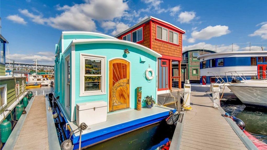 teal houseboat in seattle