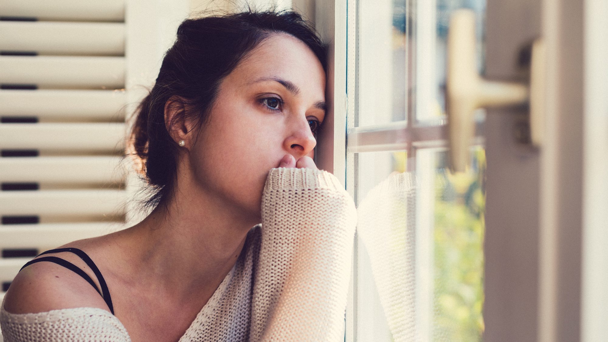 Unhappy woman at home