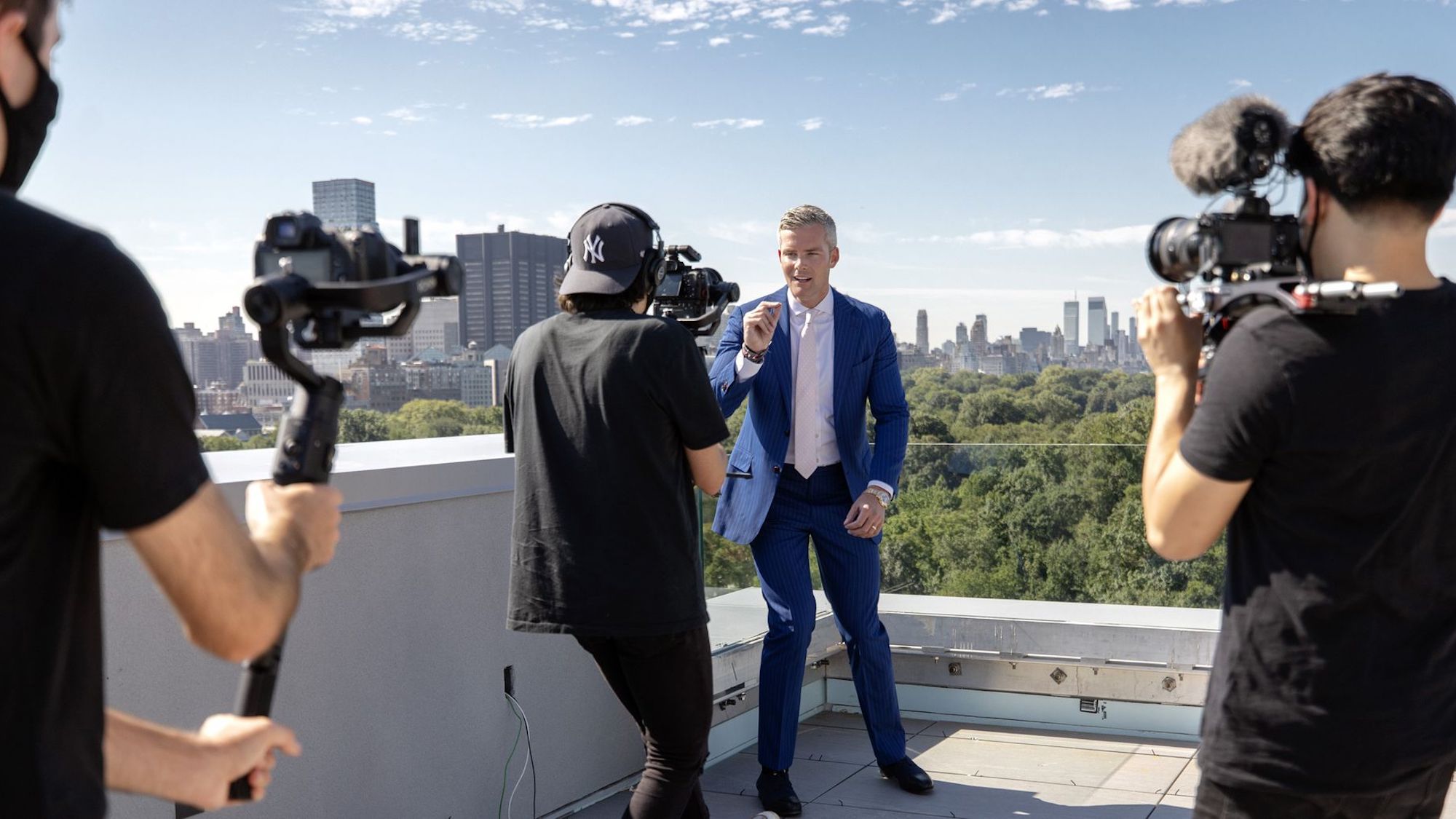 Ryan Serhant shoots a video atop 145 Central Park North.