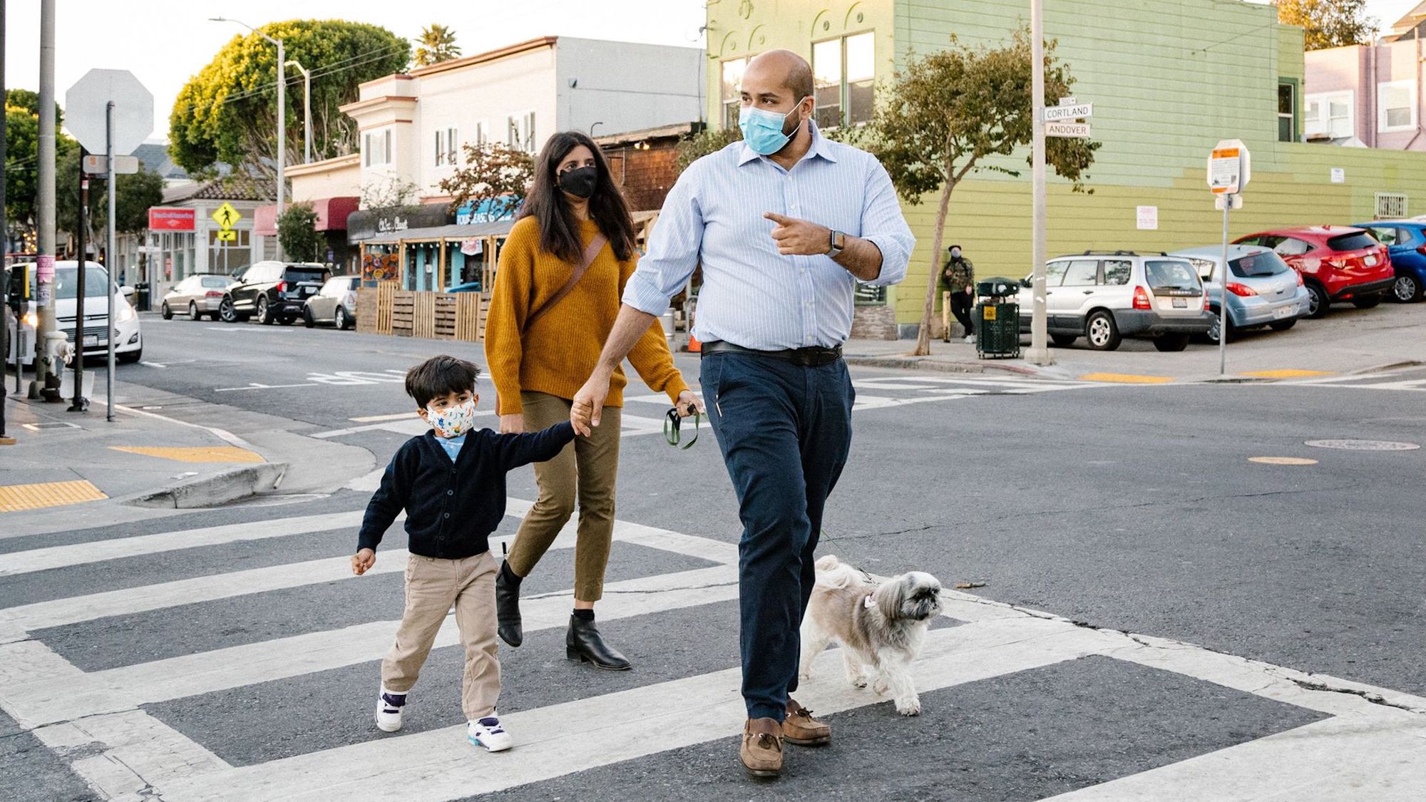 Masood Qazi and his wife Anicham Kumarasamy with their son, Kumar, in the Bernal Heights neighborhood of San Francisco, Calif.