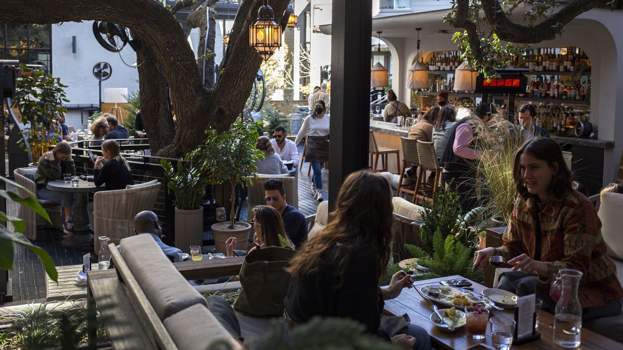 Patrons dine outdoors at Aba in Austin. The Texas city has grown in popularity with companies and remote workers this year.